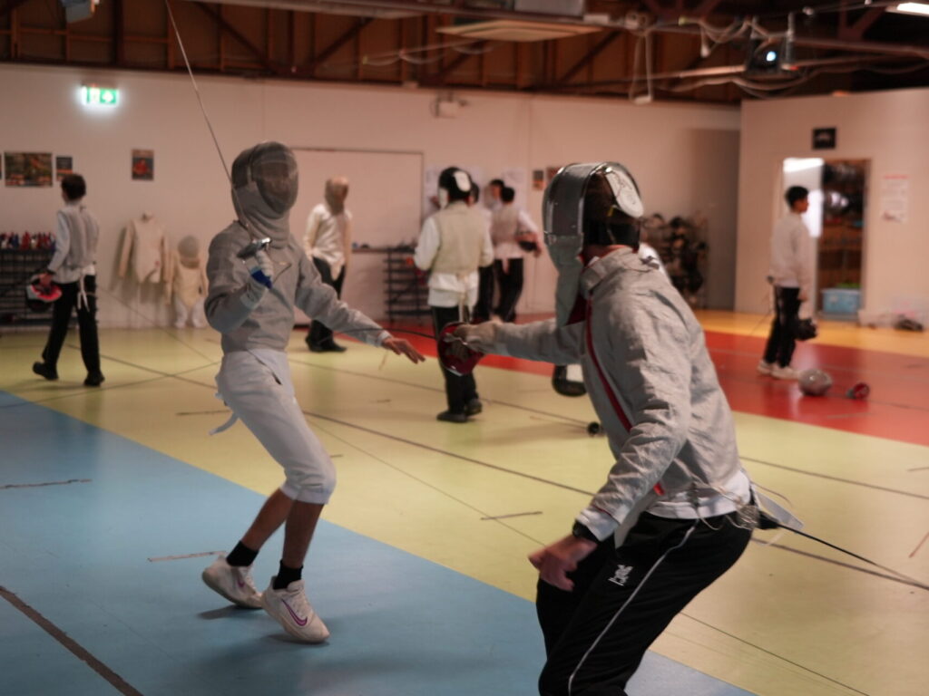En garde! Fencers carry the sword for Newington 